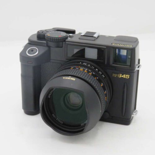 Black medium format Bronica RF645 camera with lens attached.