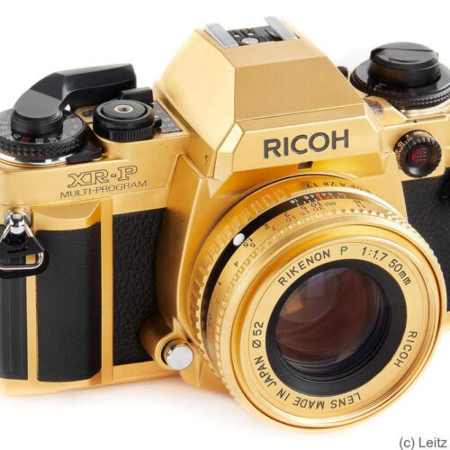 Gold-plated Ricoh XR-P film camera with Rikenon P 1:1.7 50mm lens.