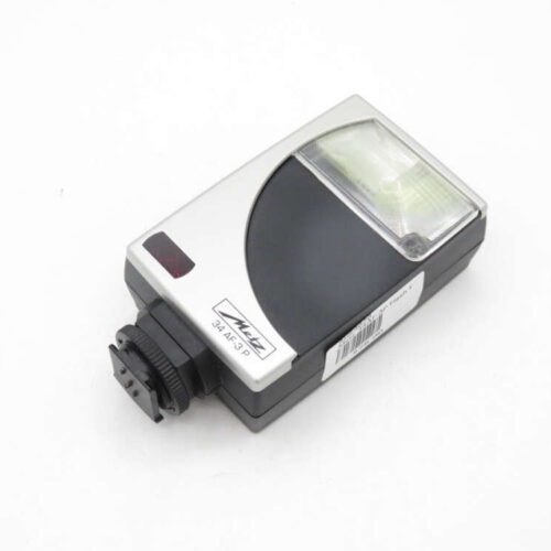 Camera flash unit with a silver and black design, model number 34 AF-3P, featuring a barcode label on the side.