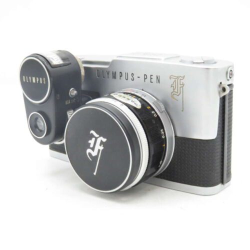 Vintage Olympus Pen F camera with attached lens, featuring a sleek silver and black design.