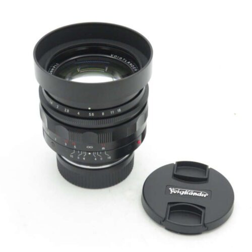 Voigtländer camera lens with lens cap.