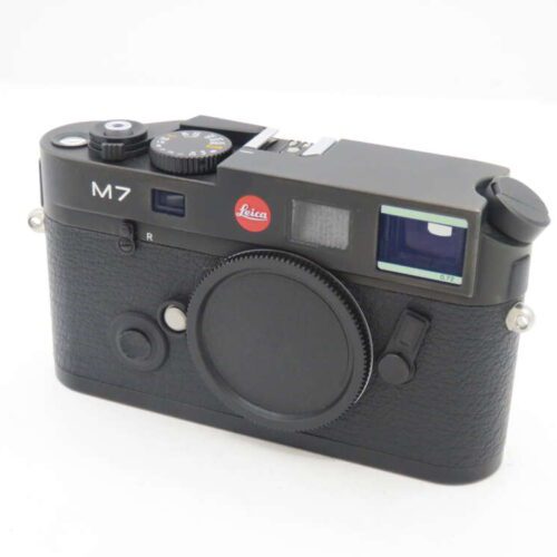 Leica M7 black rangefinder film camera with body cap attached.