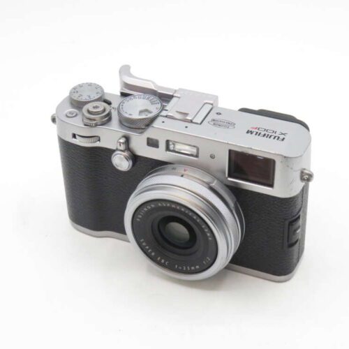 Fujifilm X100F digital camera with a silver body and black grip.
