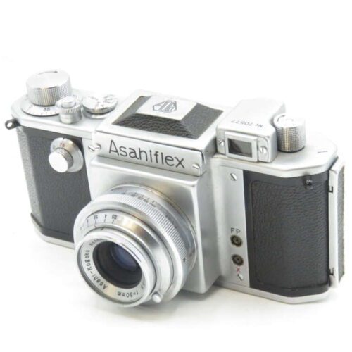 Vintage Asahiflex camera with a silver body and black leatherette accents, featuring a prominent lens and multiple dials on the top.