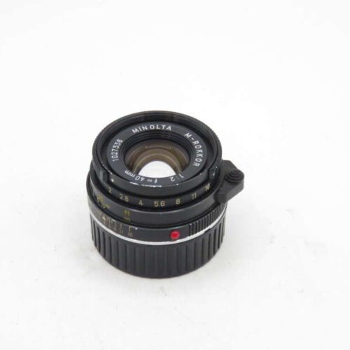 Minolta M-Rokkor 40mm f/2 camera lens on a white background.