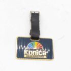 Konica Color Film & Paper keychain with a black strap