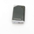 Black and silver Chinon portable electronic device with branding.