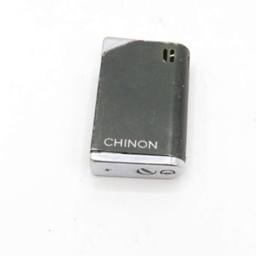 Black and silver Chinon portable electronic device with branding.