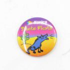 Colourful "Konica Photo Fiesta" badge featuring a cartoon howling coyote and a cactus.
