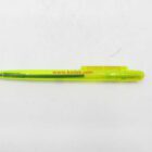 A yellow ballpoint pen with "www.kodak.com" written on the body.