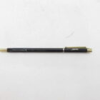 Black Pentax pen with gold clip and accents.