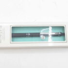 Black Platinum pen in white packaging with a transparent window.