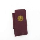 Maroon tie with a yellow emblem displaying "The Photographic Club of Great Britain."
