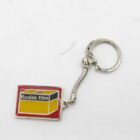 Kodak film keychain featuring a rectangular charm with a yellow and red film box design.