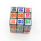 Rubik's Cube with Kodak logos on multicoloured stickers including black, blue, red, yellow, green, and orange.