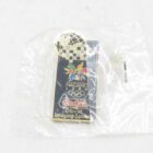 A black and gold pin commemorating the Nagano 1998 Winter Olympics, with a logo, Olympic rings, and "Kodak Official Imaging Sponsor" text.