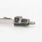 Silver tie clip shaped like a vintage Argus camera.