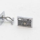 Silver cufflinks shaped like a vintage Yashica camera.