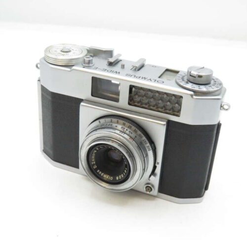 Silver Olympus Wide E vintage camera with a black grip and manual controls.