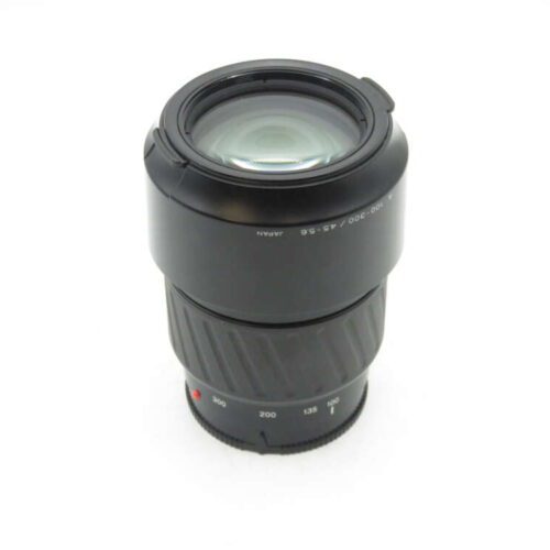 a black camera lens with a white background
