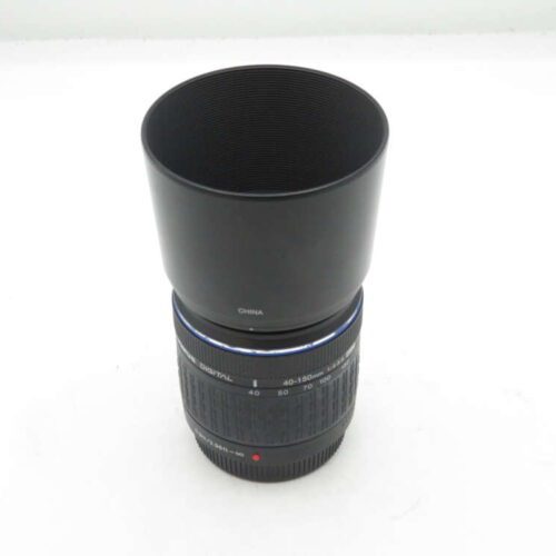 a black camera lens with a blue band