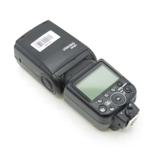 a black camera flash with a white label