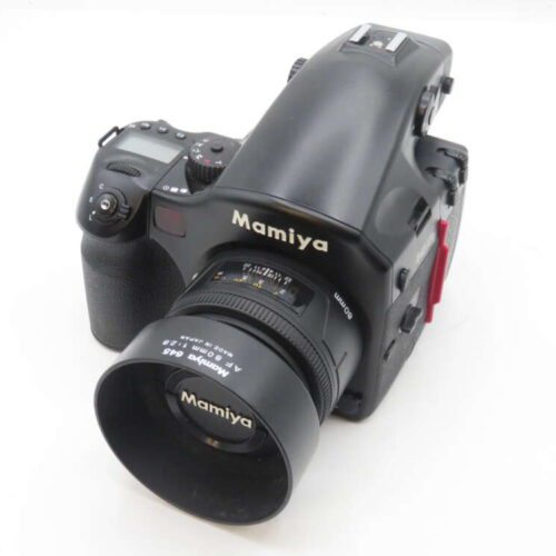 Black Mamiya medium format camera with an 80mm lens.