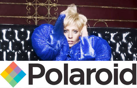 Lady Gaga in a bold blue outfit with a Polaroid logo overlay.