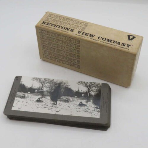Box and stack of stereoscope cards from the Keystone View Company, featuring vintage black and white images.