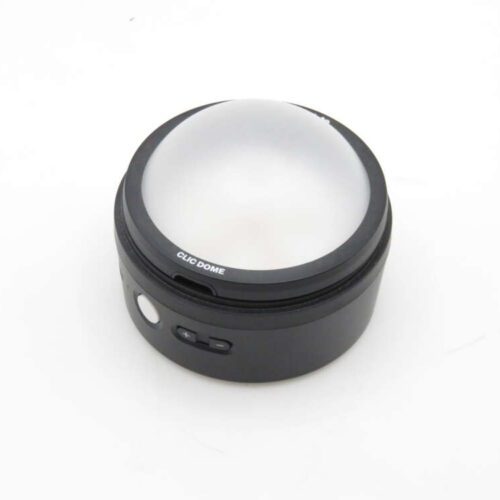 A black camera lens accessory labeled "Clic Dome" on a white background, featuring a rounded, translucent dome cover on top.