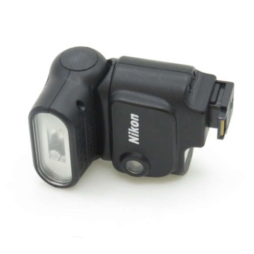 A black Nikon external camera flash unit with a multi-pin connector.