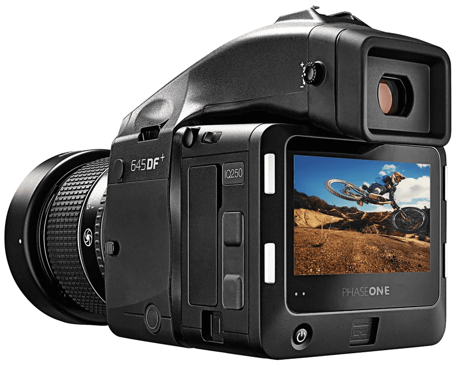A Phase One 645DF+ digital camera with an IQ250 digital back, displaying an image of a cyclist performing a jump on a dirt track on its screen.