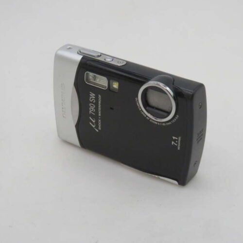 A black and silver Olympus µ 790 SW digital camera, featuring waterproof and shockproof capabilities, with 7.1 megapixel resolution.