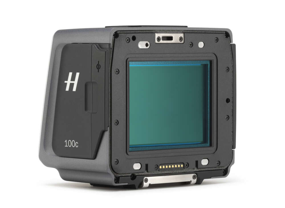 Hasselblad digital cameras back with a square sensor, branded with an 'H' and marked '100c', indicating high resolution capacity.