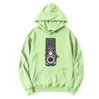 Green hoodie with a vintage camera graphic printed on the front center.