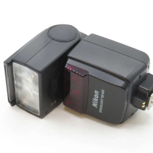 Nikon Speedlight SB-600 flash unit on a white background, showing its head and mounting base.