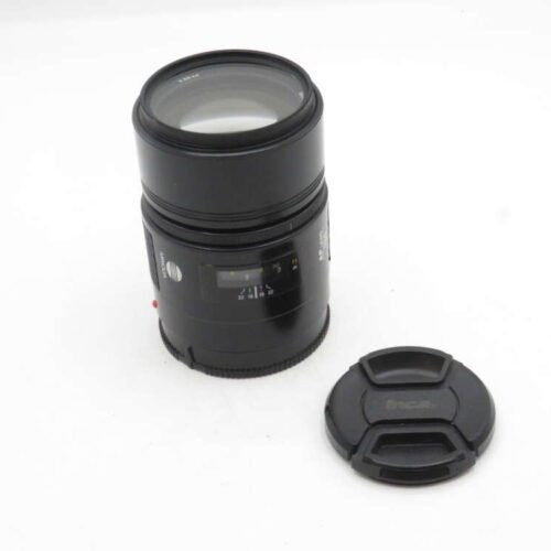Black camera lens with a separate lens cap, shown on a white background.
