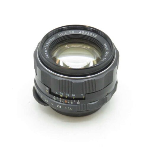 A Super-Takumar 50mm f/1.4 camera lens by Asahi Opt. Co., featuring a black exterior with distance and aperture markings visible on the barrel.