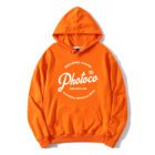 An orange hoodie with white text that reads "Second Hand Photoco Est. 1967 Adelaide, AUS Camera Specialists."