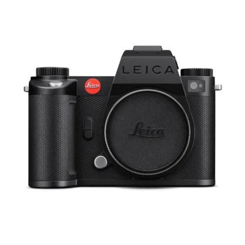 A black Leica mirrorless camera with the prominent Leica logo on the body and lens cap, featuring a textured grip and control dials on top.