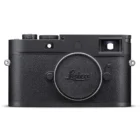 A black Leica camera with a textured body, featuring a circular lens cap and viewfinder on the top right.
