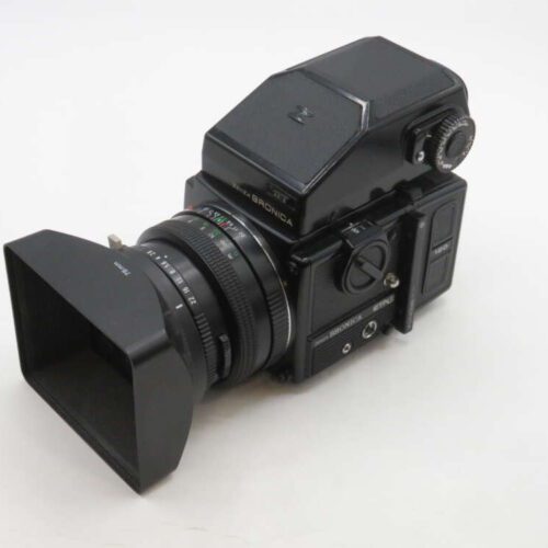 A black medium format camera with a square lens hood, featuring the brand name "Bronica" on the body and lens.