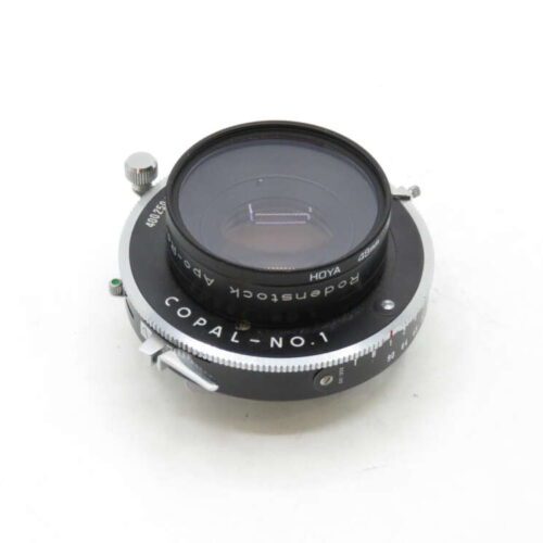 A Rodenstock Apo-Ronar 150mm camera lens mounted on a Copal-No.1 shutter, featuring a silver and black finish with visible dials and settings.