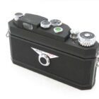 A black vintage film camera with dials and switches, featuring a prominent "Unlock" and "Lock" label on the back.