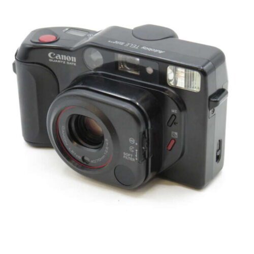 A black Canon Sure Shot Tele 80 35mm camera with a prominent lens and visible flash.