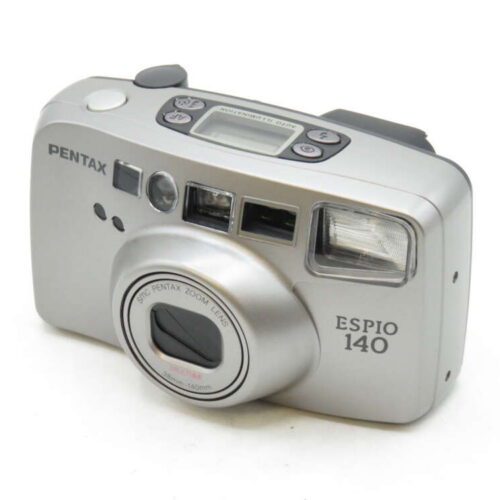 A silver Pentax Espio 140 film camera with a flash, multiple buttons, and a top digital display.