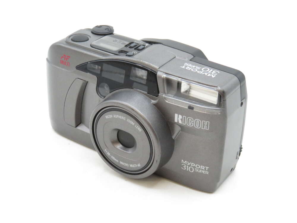 IMG_3227 Ricoh Myport 310 Super film camera with a grey body and lens details.