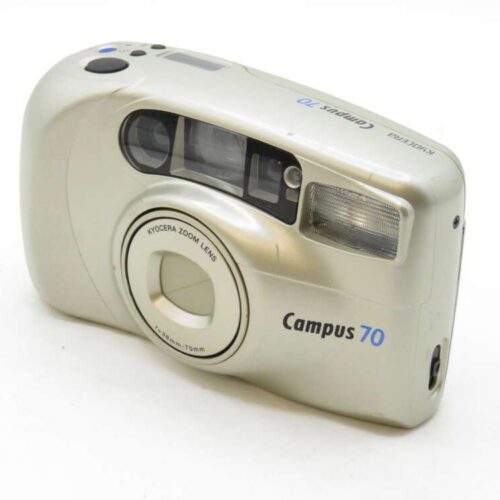 Silver Kyocera Campus 70 film camera with zoom lens and built-in flash.