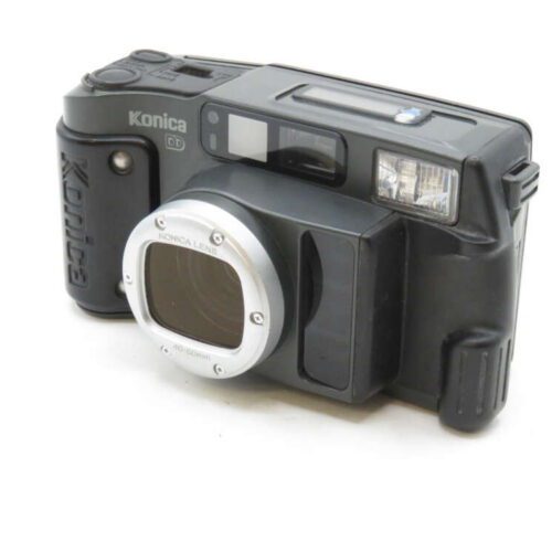 A vintage black Konica film camera with a prominent lens and various control buttons.
