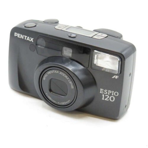 A black Pentax Espio 120 film camera with a visible lens and flash on the front.